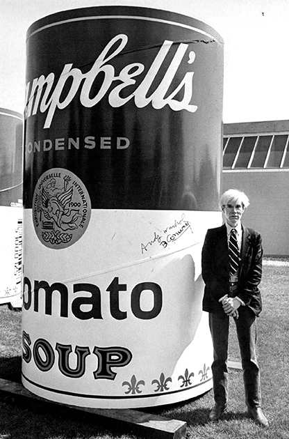 Andy Warhol with one of his Soup Cans, 1981. Image: The Denver Post (Denver Post via Getty Images), Artwork: © 2022 The Andy Warhol Foundation for the Visual Arts, Inc. / Licensed by DACS, London